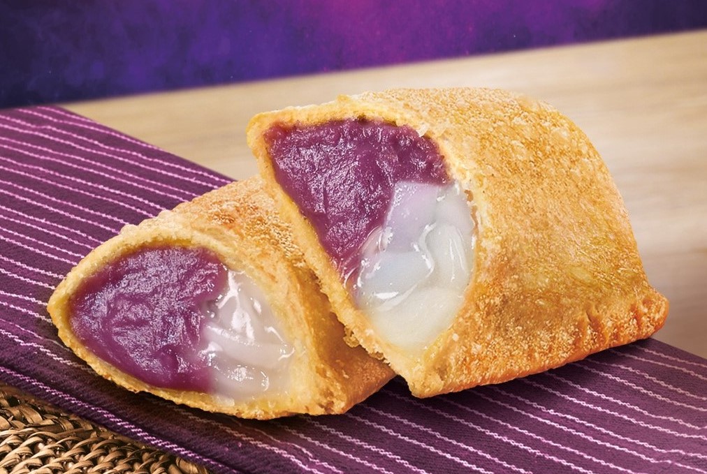 The Jollibee Ube Macapuno Pie blends the sweet and classic flavors of ube a...